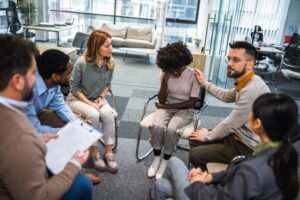 Group,Of,People,Sitting,In,A,Circle,Are,Participating,In